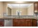 Kitchen area featuring granite countertops and stainless steel dishwasher at 507 Brier Crossings Loop, Durham, NC 27703
