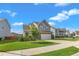 Beautifully landscaped front yard leads to this charming two-story home with a convenient two-car garage at 525 Willow Breeze Ct, Zebulon, NC 27597