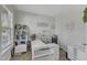 Bright home office with modern desk and shelving offers a functional workspace for productivity and organization at 525 Willow Breeze Ct, Zebulon, NC 27597