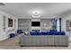 Elegant living room showcasing decorative shelving, comfortable seating, and a spacious layout for entertaining guests at 525 Willow Breeze Ct, Zebulon, NC 27597