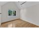 Attic features hardwood floors, a window with view, and recessed lighting at 5309 Overtop Ln, Raleigh, NC 27613