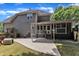 Spacious backyard with covered patio and well-manicured lawn, perfect for outdoor activities and relaxation at 5309 Overtop Ln, Raleigh, NC 27613