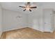 Bedroom with hardwood floors and ceiling fan at 5309 Overtop Ln, Raleigh, NC 27613