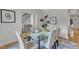 Chic dining room with a glass table, seating for six, and stylish decor at 5309 Overtop Ln, Raleigh, NC 27613