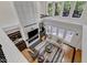 Two-story living room with fire place, TV, and natural light at 5309 Overtop Ln, Raleigh, NC 27613