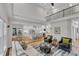 Bright, open floor plan living area leads to a modern kitchen and second story at 5309 Overtop Ln, Raleigh, NC 27613