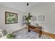 Bright office space with hardwood floors, a ceiling fan, and large windows at 5309 Overtop Ln, Raleigh, NC 27613