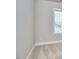 Neutral bedroom featuring large windows offering natural light and beige carpet at 554 Beacon Ridge Blvd, Chapel Hill, NC 27516
