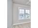 Bedroom with natural light from windows and beige carpet throughout at 554 Beacon Ridge Blvd, Chapel Hill, NC 27516