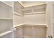 Walk-in closet with shelving and rod provides organized storage space at 554 Beacon Ridge Blvd, Chapel Hill, NC 27516