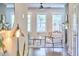 Open concept living room with modern decor, plenty of natural light, and stylish furniture at 554 Beacon Ridge Blvd, Chapel Hill, NC 27516