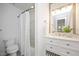 Bathroom with a shower-tub combo and vanity with decorative plants at 600 Audubon Lake Dr # 4B11, Durham, NC 27713