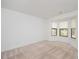 Bright bedroom with neutral carpet and a large bay window at 600 Audubon Lake Dr # 4B11, Durham, NC 27713