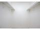 Walk-in closet with built-in shelving for storage at 600 Audubon Lake Dr # 4B11, Durham, NC 27713