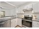 Efficient kitchen with stainless steel appliances and ample counter space at 600 Audubon Lake Dr # 4B11, Durham, NC 27713