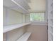 Pantry is well-lit with adjustable shelving and window at 601 E Franklin St, Raleigh, NC 27604