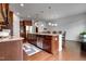 Spacious kitchen with stainless steel appliances, granite countertops and a large center island at 6027 Kentworth Drive. Dr, Holly Springs, NC 27540