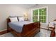 Cozy bedroom with hard wood floors, large window, and plenty of natural light at 603 Edburton Ct, Hillsborough, NC 27278