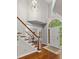 Bright foyer with grand staircase, hardwood floors, and a soaring two-story ceiling at 603 Edburton Ct, Hillsborough, NC 27278