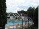 Community pool featuring a view of clubhouse at 603 Edburton Ct, Hillsborough, NC 27278