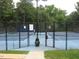 Well-maintained community tennis court at 603 Edburton Ct, Hillsborough, NC 27278