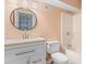 Updated bathroom features a modern vanity and a tub-shower combination at 619 S Fifth St, Mebane, NC 27302