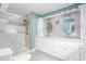 Beautiful bathroom featuring a double sink vanity, tiled backsplash, and glass-enclosed shower at 619 S Fifth St, Mebane, NC 27302