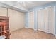 Basement bedroom with closet, dresser and ceiling fan at 619 S Fifth St, Mebane, NC 27302