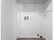 Utility room with white walls and wire rack shelving ready for organizing storage items at 619 S Fifth St, Mebane, NC 27302