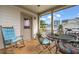Cozy back porch with comfortable seating, perfect for relaxing and enjoying the outdoors at 710 Vine Pkwy, Pittsboro, NC 27312