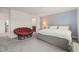Comfortable bedroom featuring a seating area, and ample natural light at 710 Vine Pkwy, Pittsboro, NC 27312