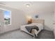 Bright bedroom with a large window, offering plenty of natural light at 710 Vine Pkwy, Pittsboro, NC 27312