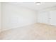 Bright, vacant bedroom featuring neutral carpet, fresh paint, and closet for storage at 7501 Montibillo Pkwy, Durham, NC 27713