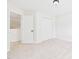 Bright bedroom featuring carpet, closet, and natural light at 7501 Montibillo Pkwy, Durham, NC 27713