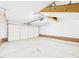 Clean, bright garage showcasing a functional space with white walls and a visible garage door mechanism at 7501 Montibillo Pkwy, Durham, NC 27713