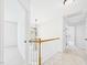 Upstairs hallway featuring a staircase and chandelier at 7501 Montibillo Pkwy, Durham, NC 27713