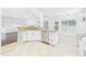 Open concept kitchen with a granite island and stainless steel dishwasher at 7501 Montibillo Pkwy, Durham, NC 27713