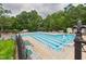 Large outdoor community pool with lap lanes, lounge chairs and ample deck space at 7501 Montibillo Pkwy, Durham, NC 27713