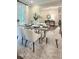 Bright dining area featuring modern furnishings, stylish decor, and ample natural light at 800 Lakestone Dr, Raleigh, NC 27609