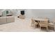 Expansive game room with a seating area, game table, and soft carpet at 800 Lakestone Dr, Raleigh, NC 27609