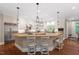 Modern kitchen with stainless steel appliances, island seating, and an open layout for easy entertaining at 800 Lakestone Dr, Raleigh, NC 27609