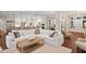 Open-concept living room with stylish lighting and a cozy, oversized sectional sofa at 800 Lakestone Dr, Raleigh, NC 27609