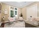 Comfortable sitting room with natural light and neutral decor perfect for relaxing or reading at 800 Lakestone Dr, Raleigh, NC 27609