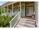 Front entrance featuring a light and bright porch and well-maintained steps at 100 Virginia Lee Ln, Efland, NC 27243