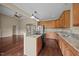 Spacious kitchen featuring granite countertops, stainless steel appliances, and a breakfast bar at 100 Virginia Lee Ln, Efland, NC 27243