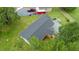 New roof on home with inviting backyard and covered deck, perfect for outdoor relaxation at 1006 S Second Ave Ave, Siler City, NC 27344