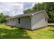 This house features a well-maintained lawn with a wood porch at 1006 S Second Ave Ave, Siler City, NC 27344