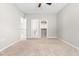 Bedroom features neutral walls, carpet flooring and doorways to the bathroom, hallway and walk-in closet at 1007 Epiphany Rd, Morrisville, NC 27560