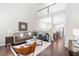 Open-concept living room with high ceilings and a view of the upstairs loft at 1007 Epiphany Rd, Morrisville, NC 27560