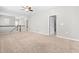 Well-lit loft area with carpeting, ceiling fan, neutral walls, and easy access to the rest of the home at 1007 Epiphany Rd, Morrisville, NC 27560